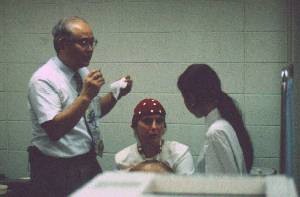 Prof Yoshio Machi, Carol Everett and Interpreter At Tokyo Denki University Labs.